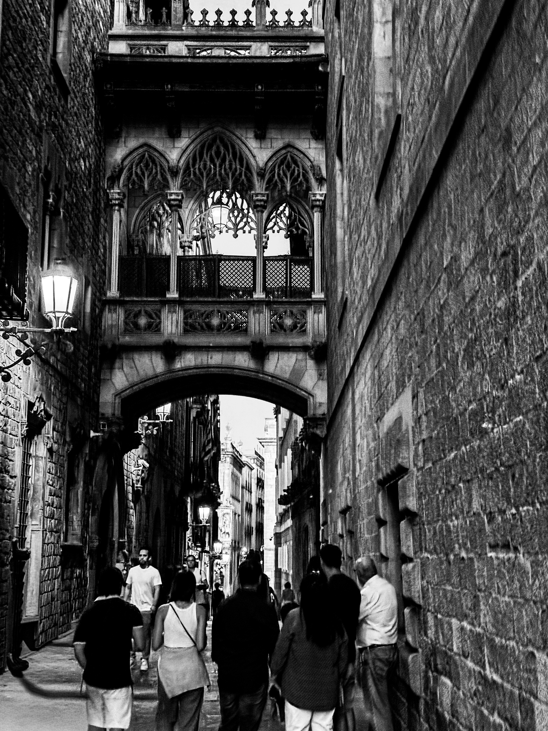 Gothic quarter alley with bridge