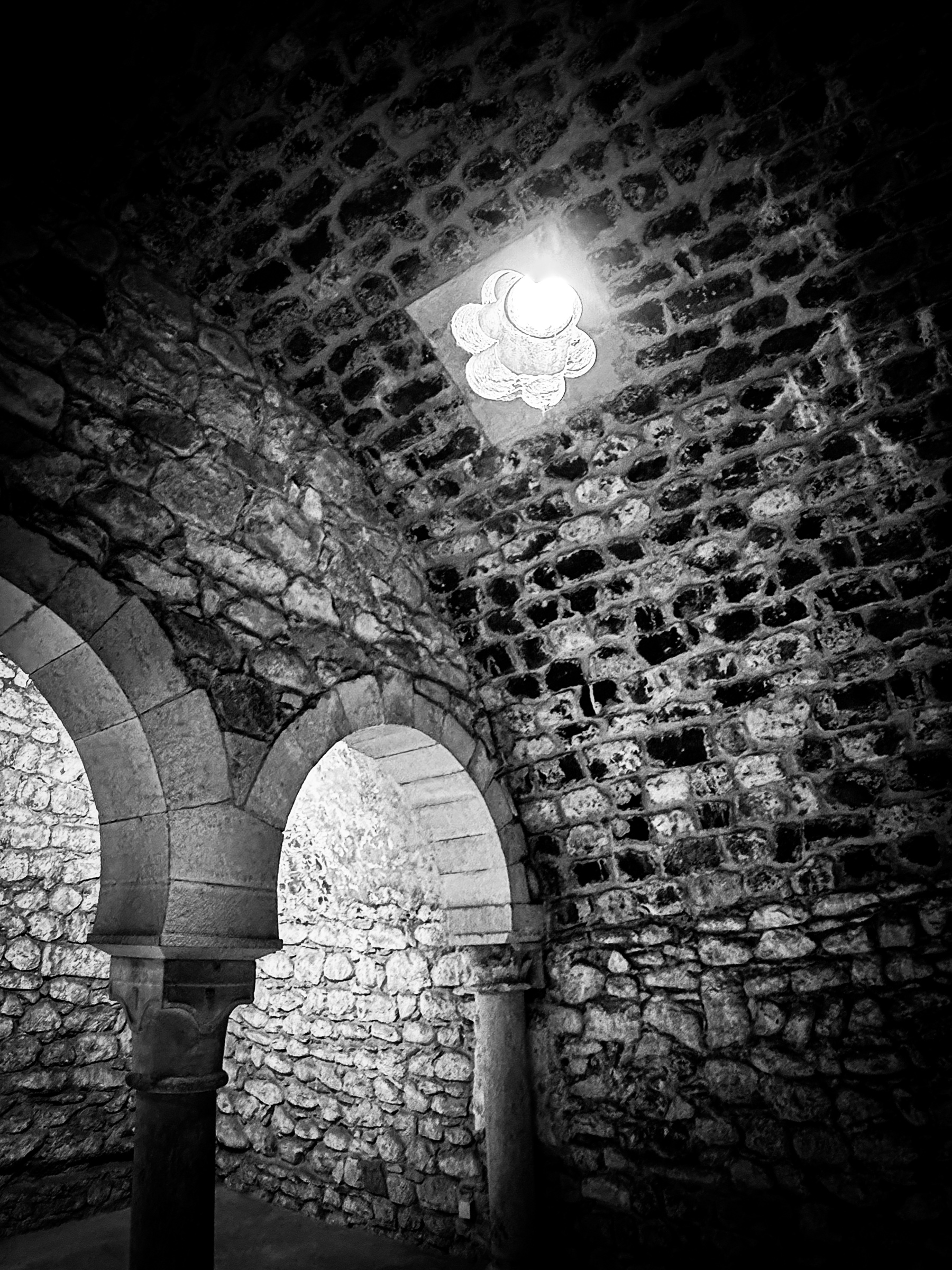 Looking up at light through architecture