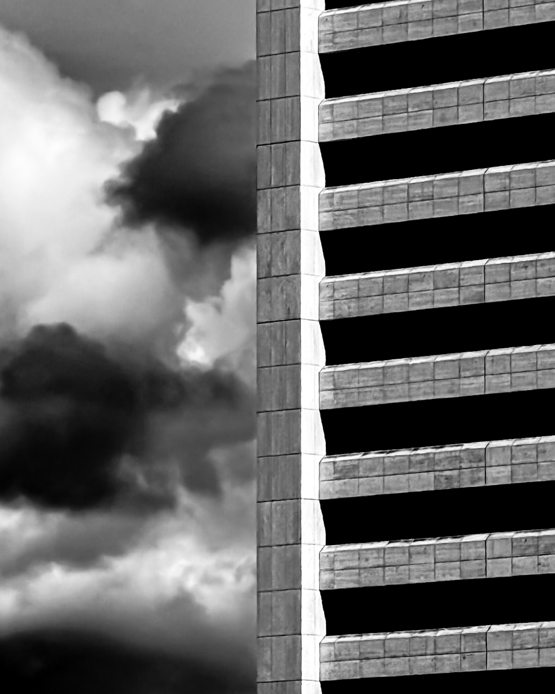 High rise against clouds
