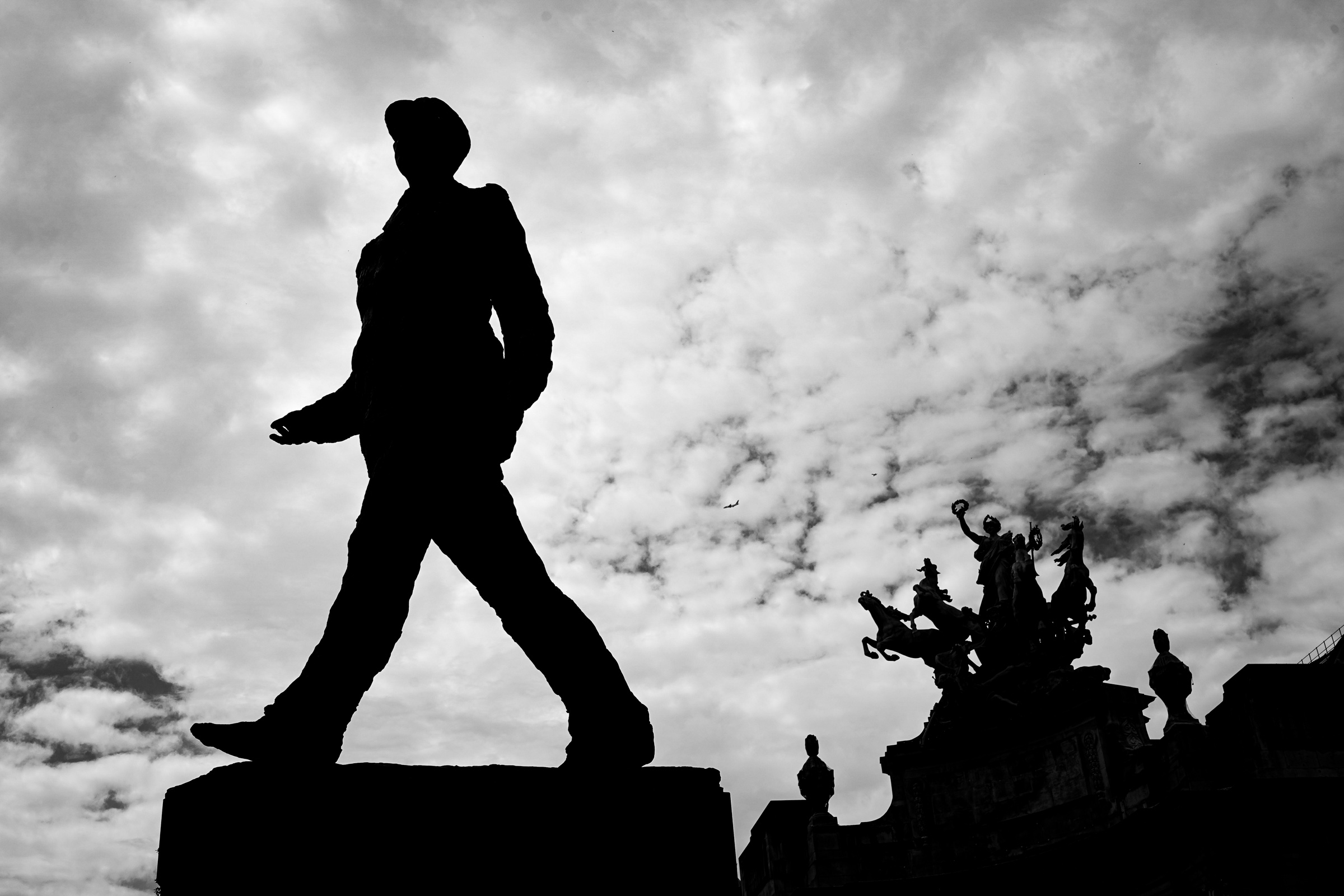 Walking statue