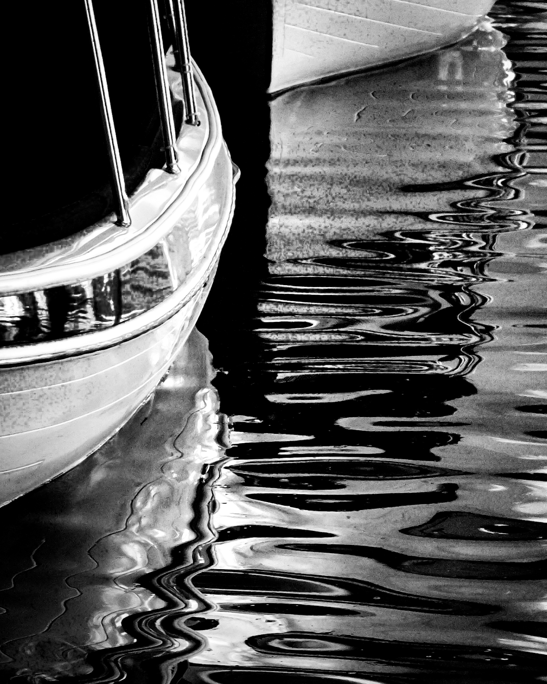 White wood boat on long exposure water — Palm Desert, California