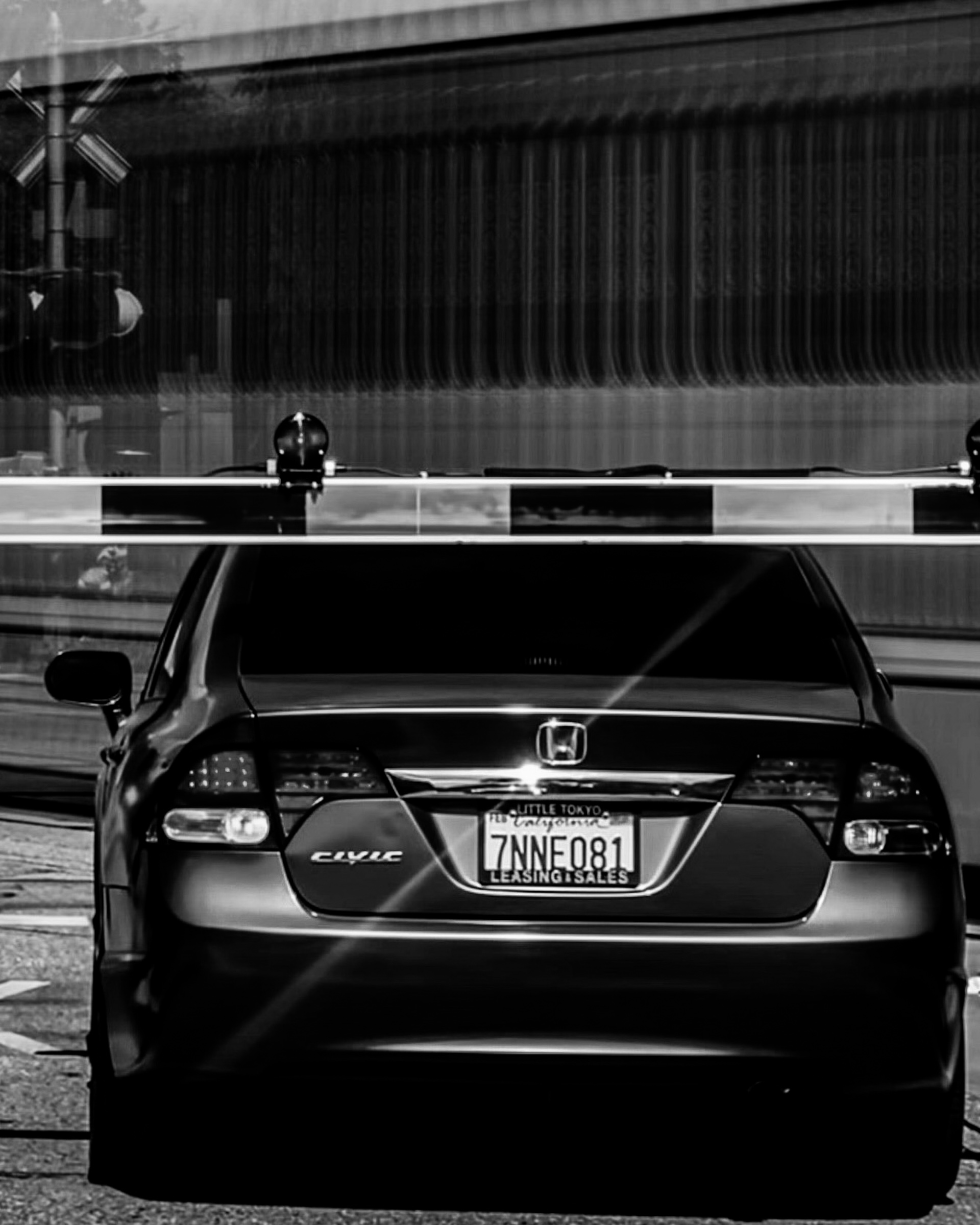 Car stopped on the wrong side of train tracks — South Pasadena, California