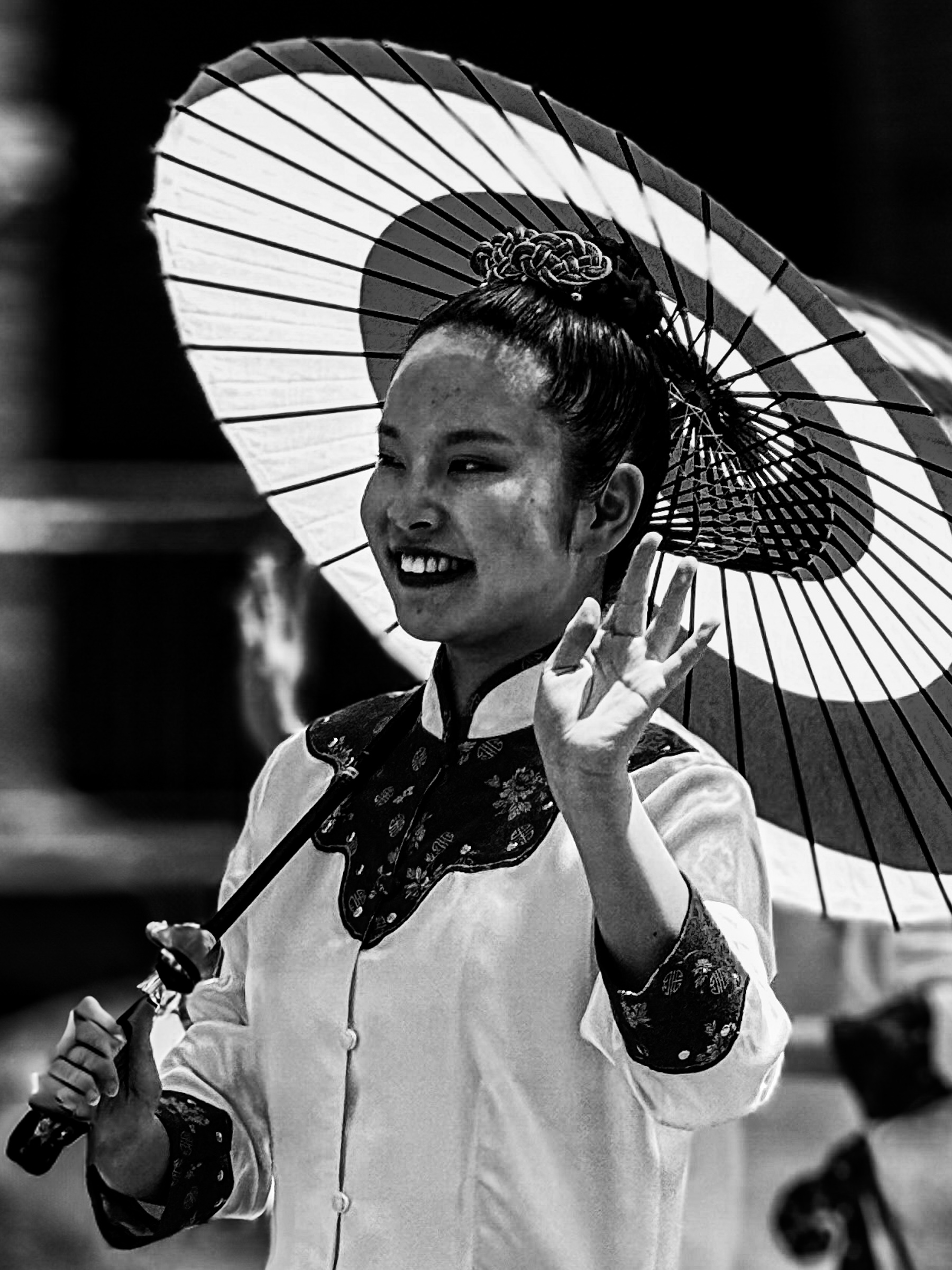 Rose Parade marcher carrying a decorative sun umbrella — Pasadena, California