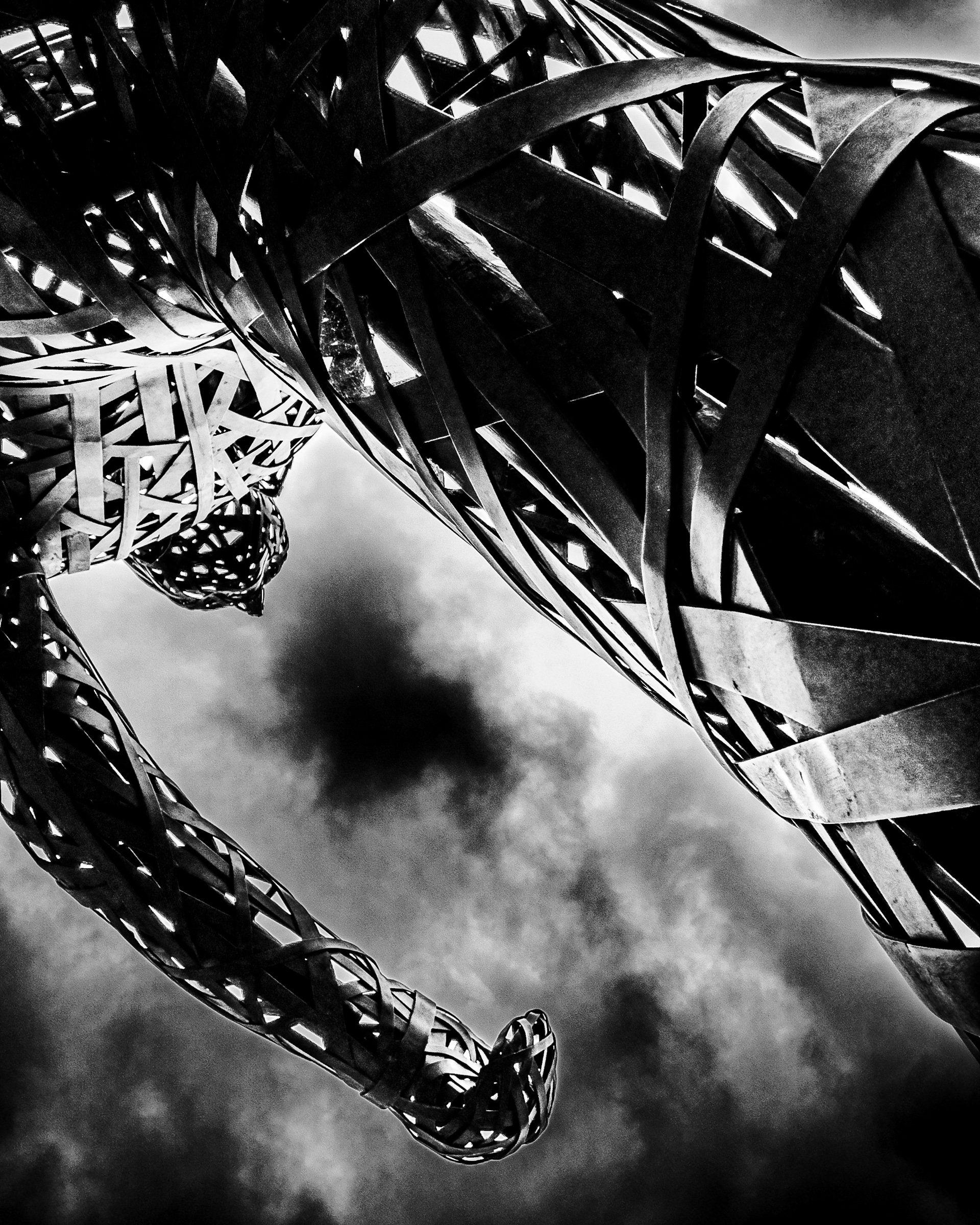 Walking Man sculpture at the South Pasadena Metro station, from below looking up — South Pasadena, California