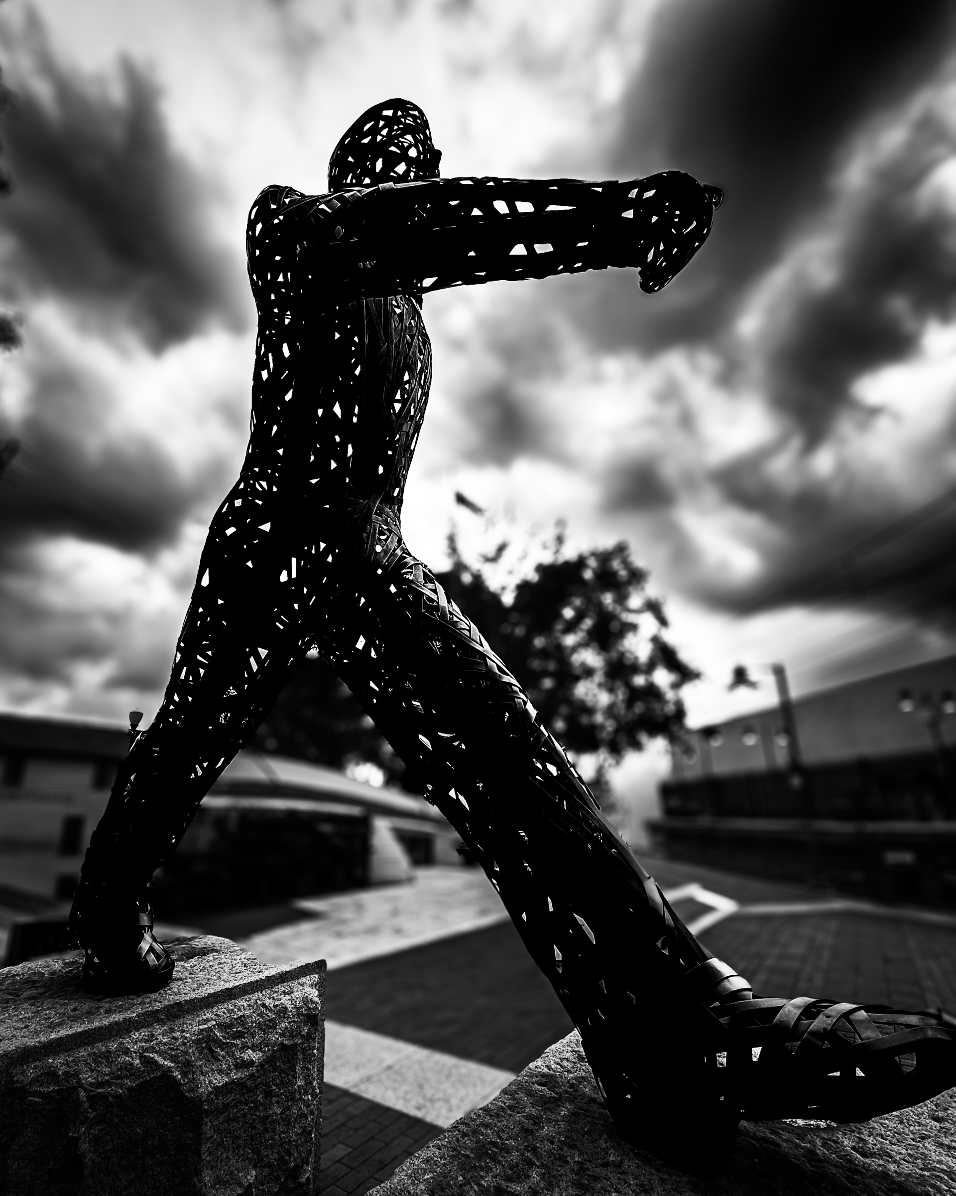Walking Man sculpture at the South Pasadena Metro station, full view — South Pasadena, California
