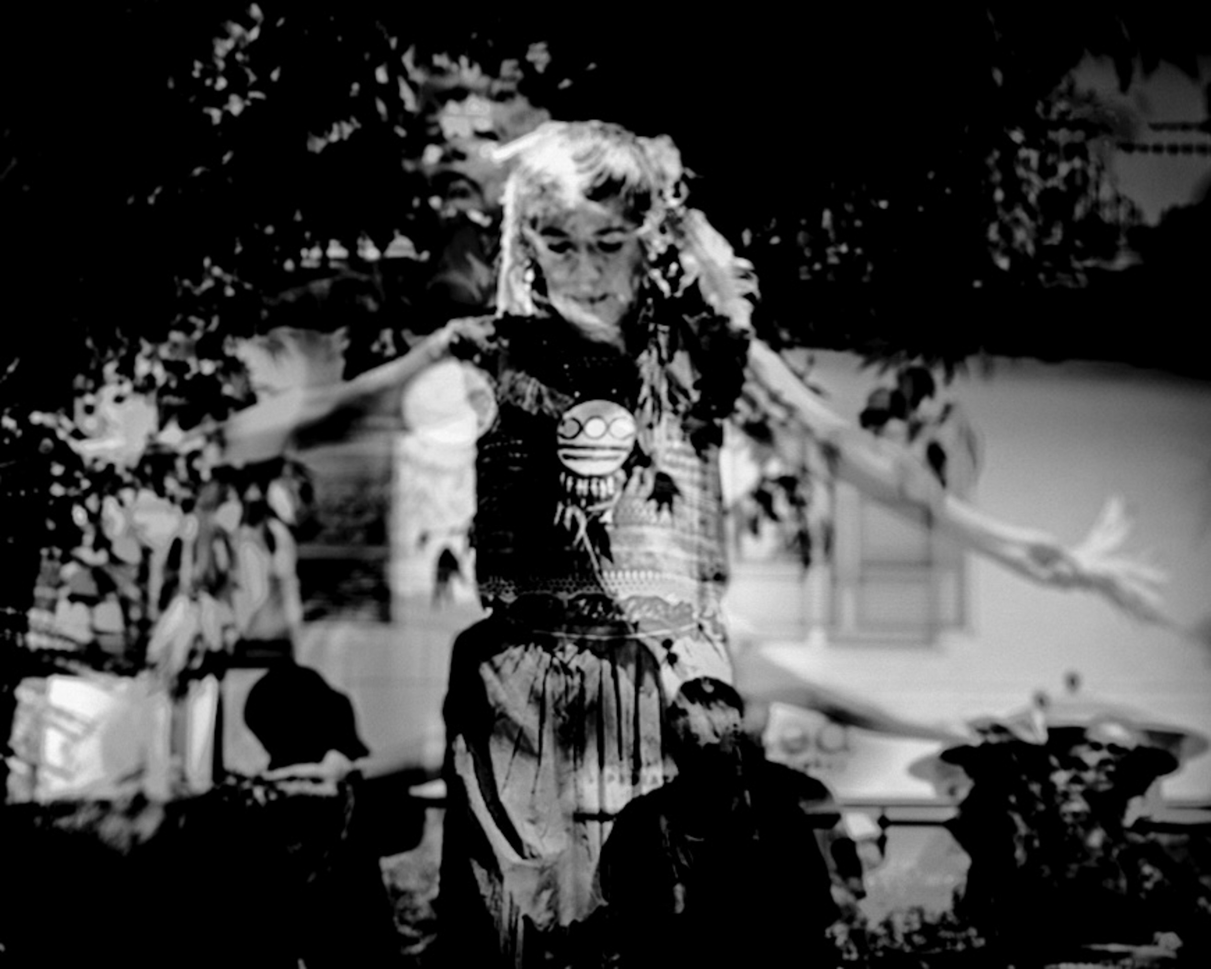 Indigenous dancers outside Vroman's - Lead dancer 