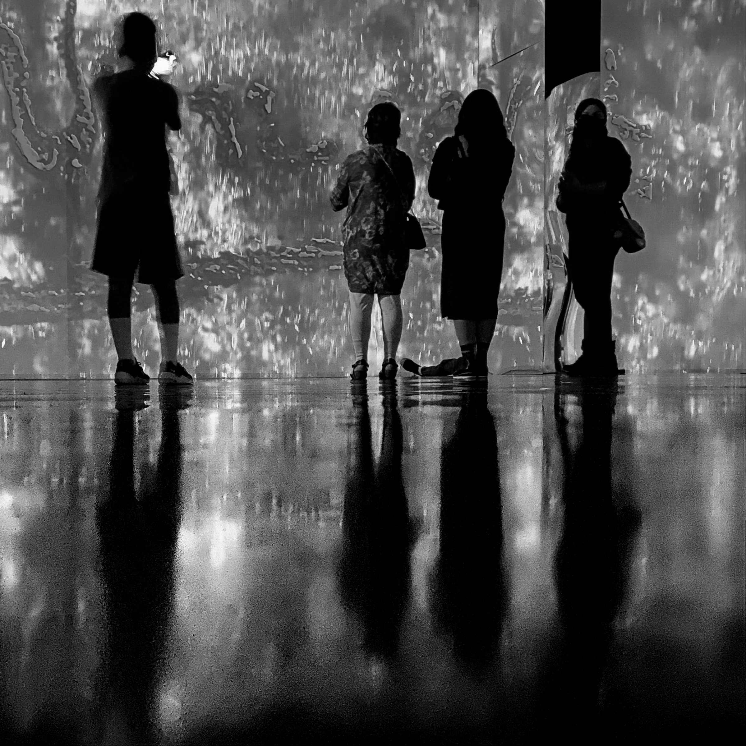 Four people silhouettes
