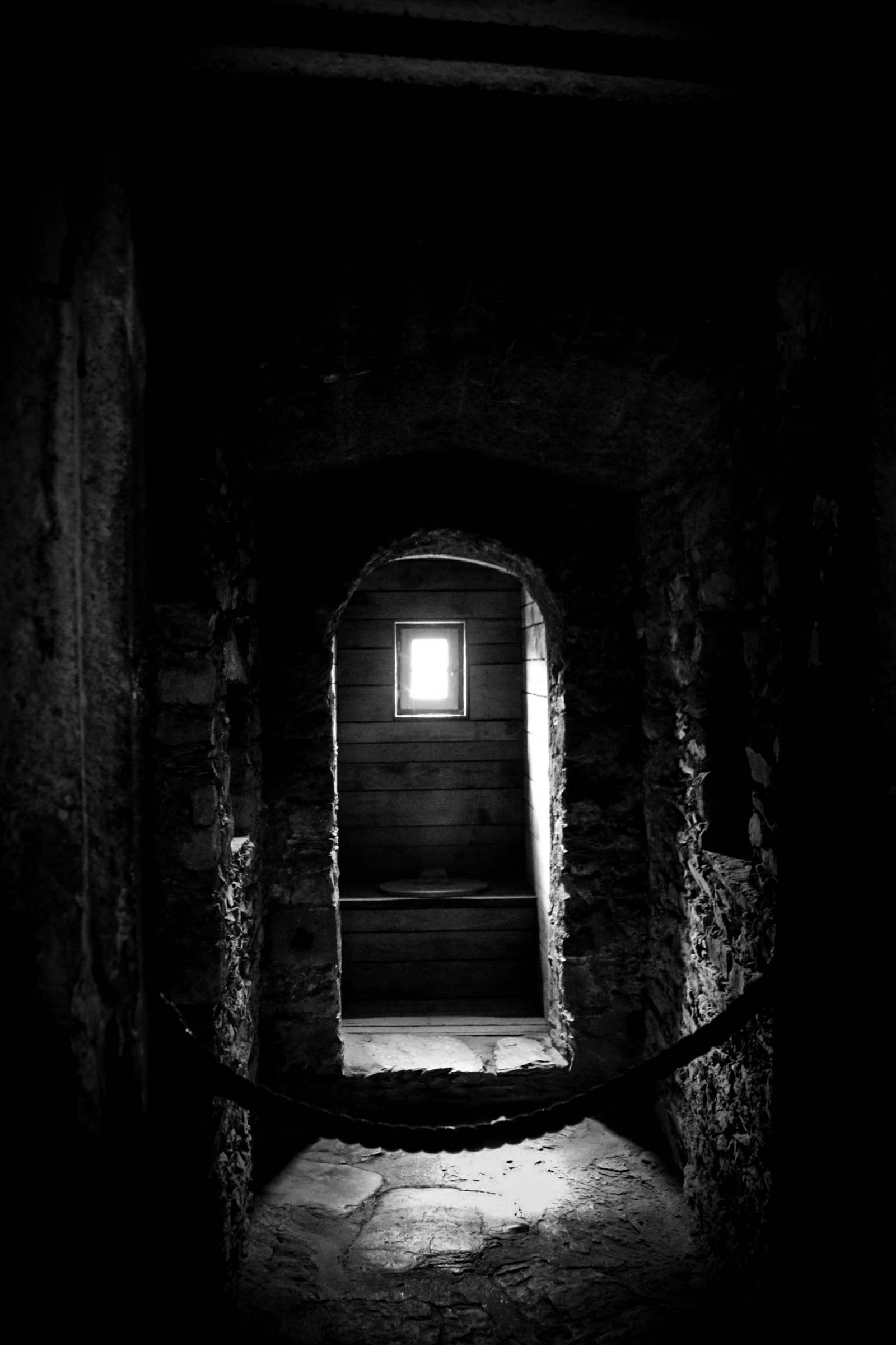 Castle archway with light through window