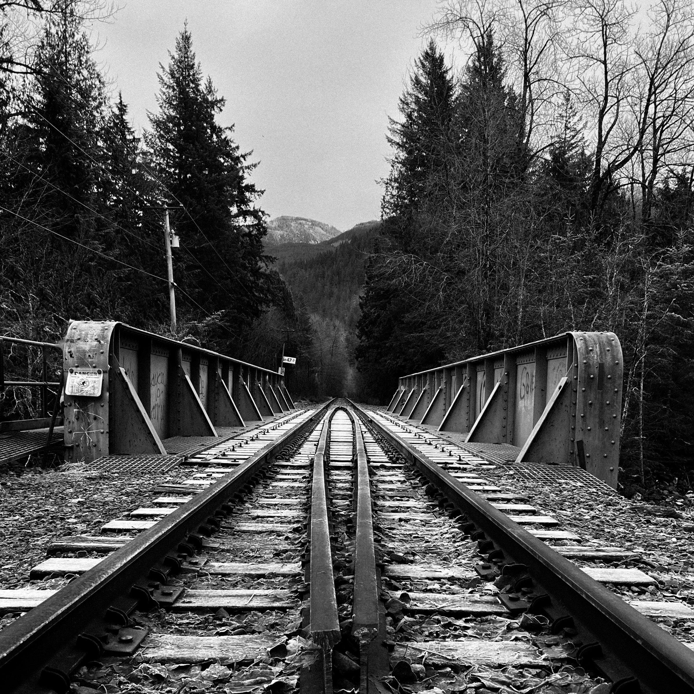 Railway tracks in square crop, winter landscape — Whistler, British Columbia